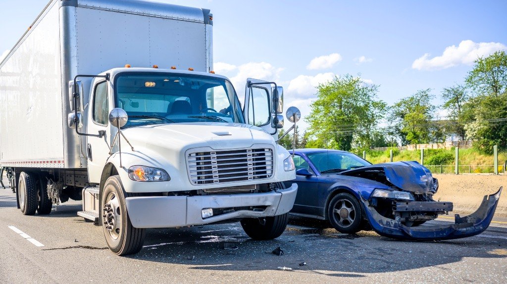 Collision between semi truck and car on the highway_s Collision between semi truck and car on the highway