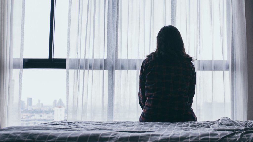 Woman experiencing emotional distress after an injury