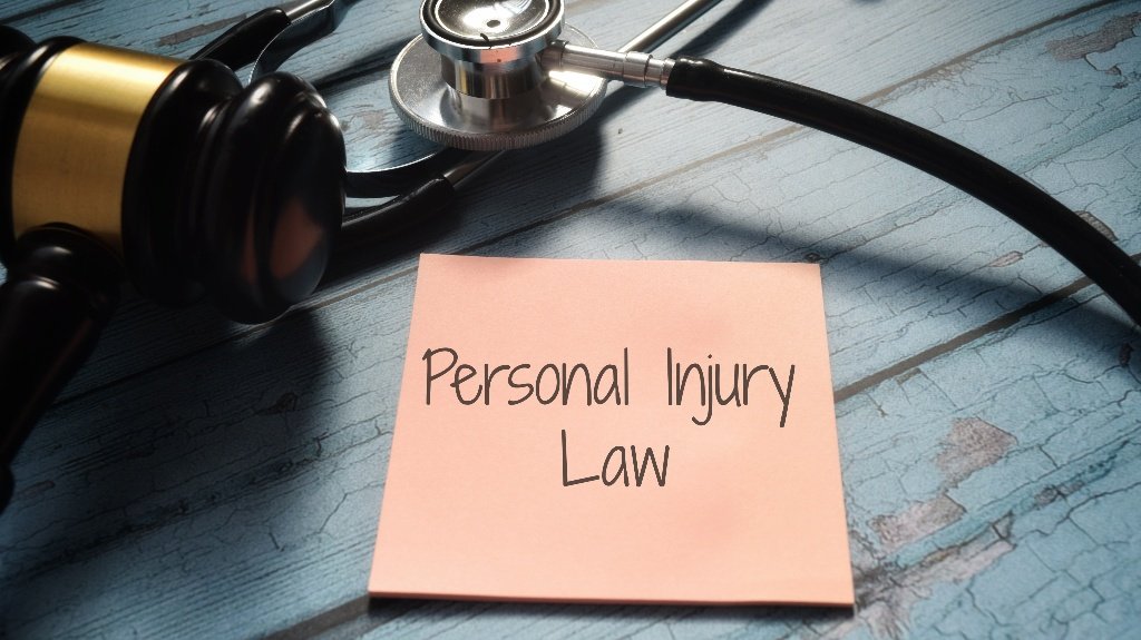 Personal Injury Law wording with stethoscope and gavel_s Do You Need to Go to Court for a Personal Injury Case in Illinois?