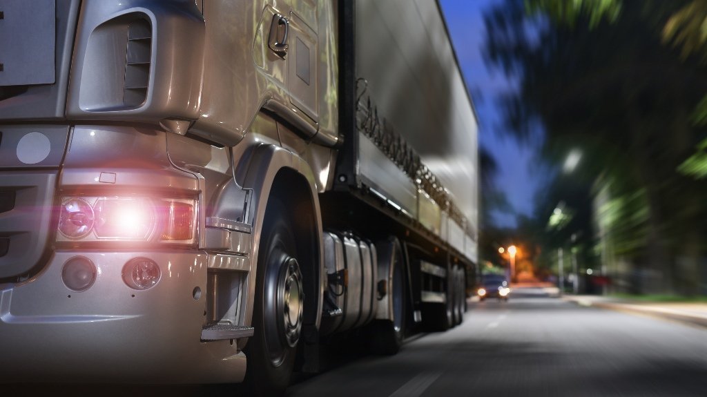 Semi-drives through the city at night_s Semi-truck drives through the city at night